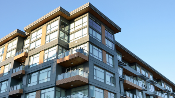 The corner of the top floors of an apartment building.